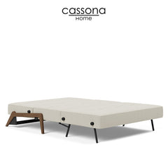 CUBED SOFA BED WITH DARK WOOD LEGS